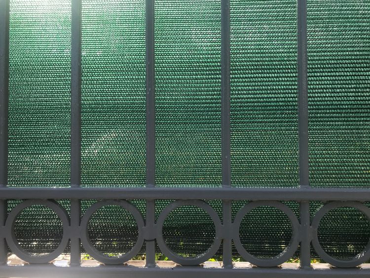 Zelená tieniaca sieť na plot