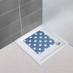 Tmavomodrá protišmyková kúpeľňová podložka Wenko Stella Dark Blue, 54 × 54 cm